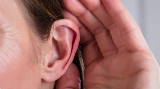 ear and hand cupping